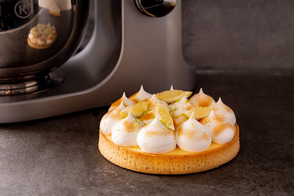 Lemon passion fruit tart topped with torched ginger meringue