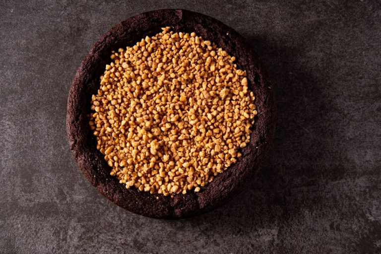 Giant peanut butter chocolate cookie cut into slices
